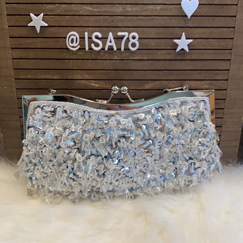 Sequin clutch bag with crystals.